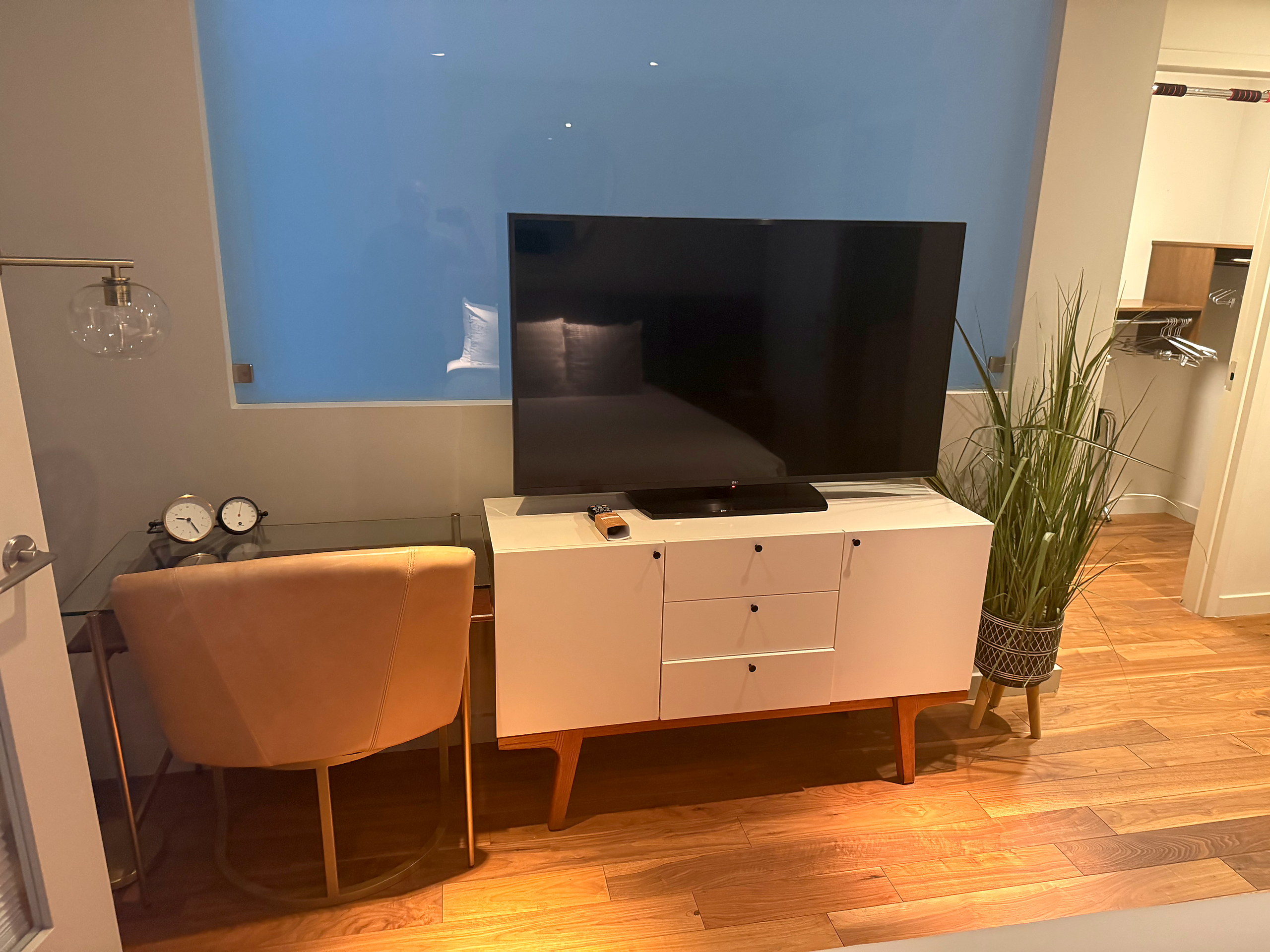 Media console, television and accent chairs