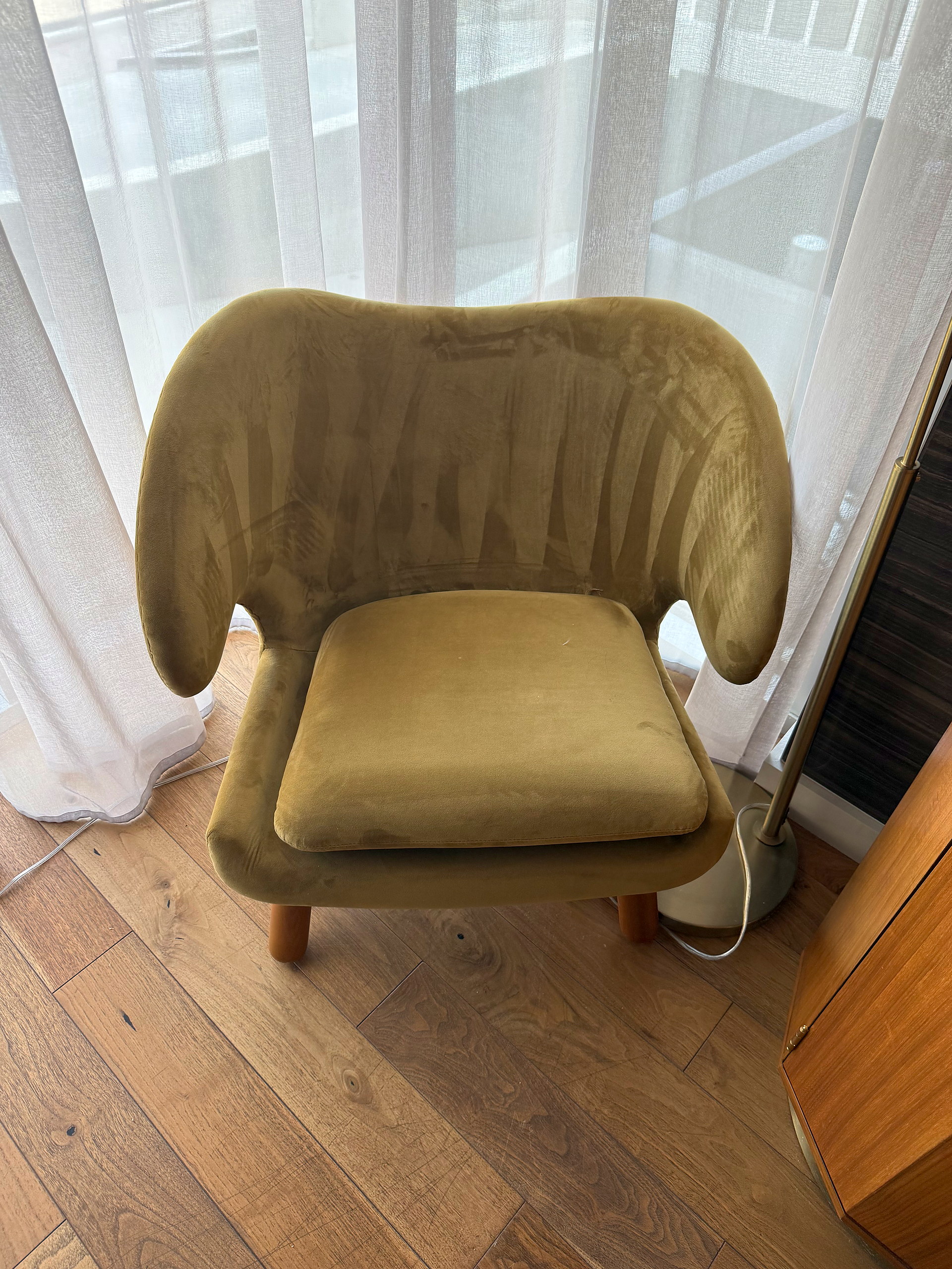 Olive velvet wing lounge chair