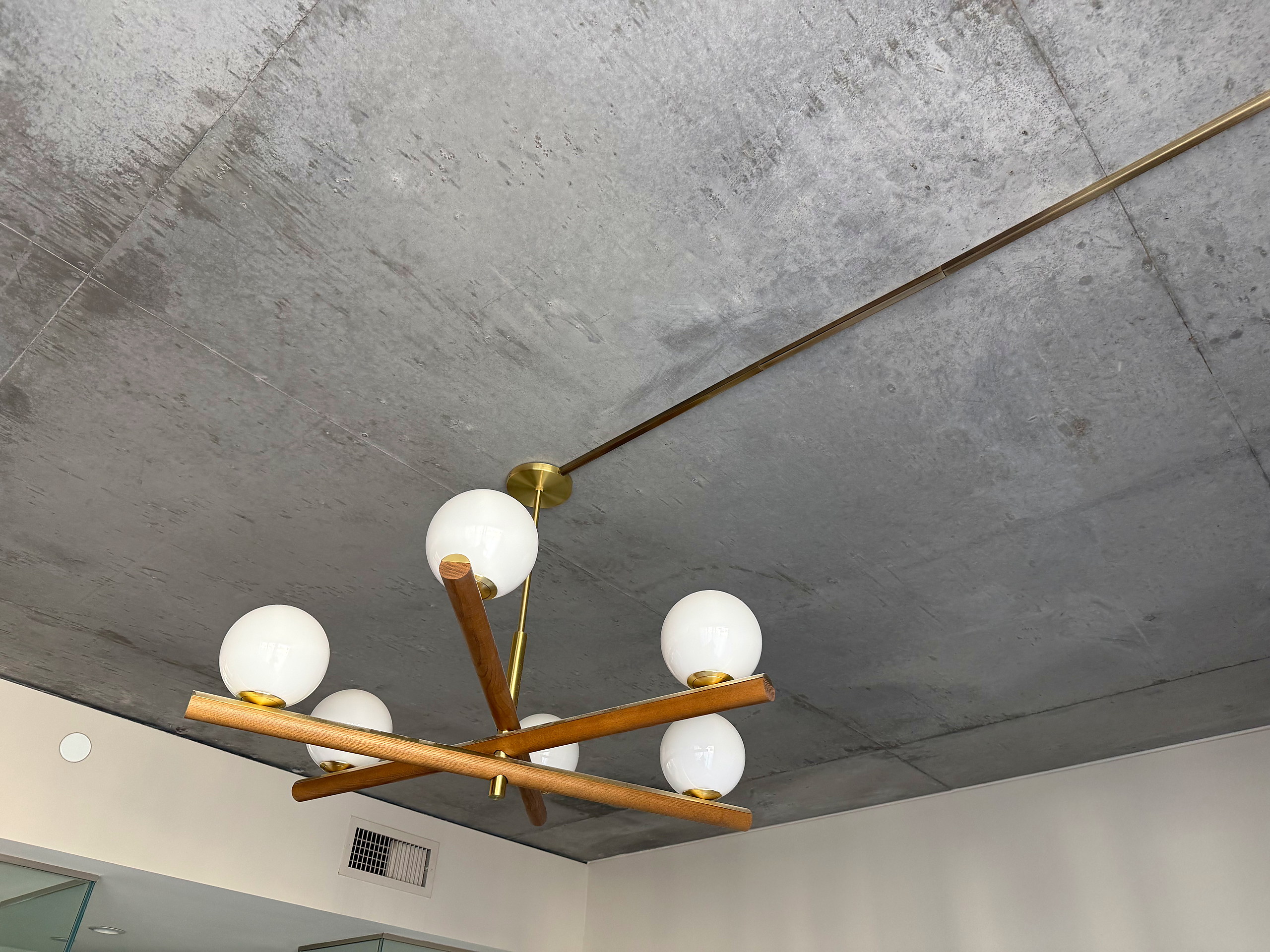 Wood and brass globe chandelier