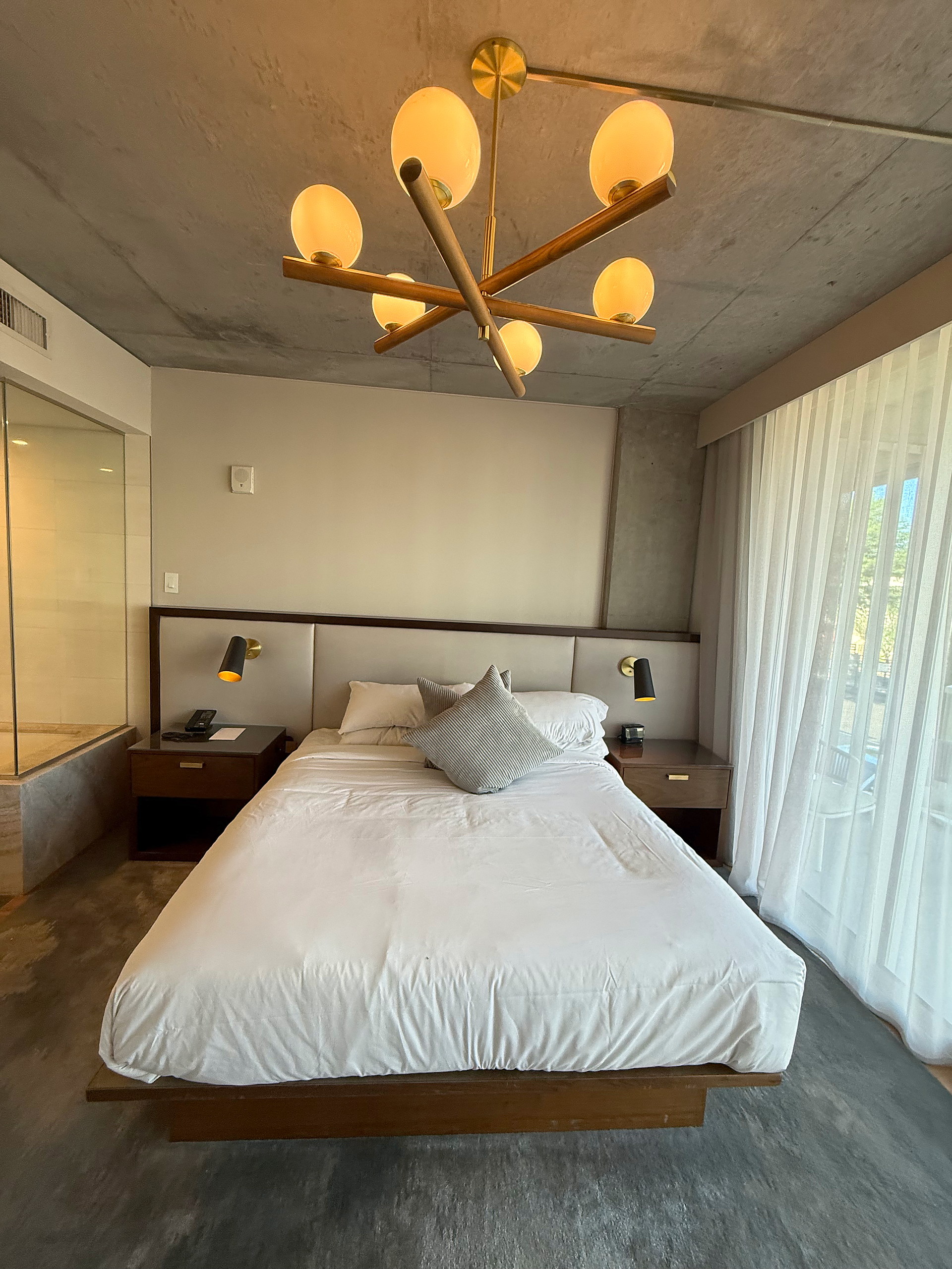 Upholstered headboard with integrated reading lights
