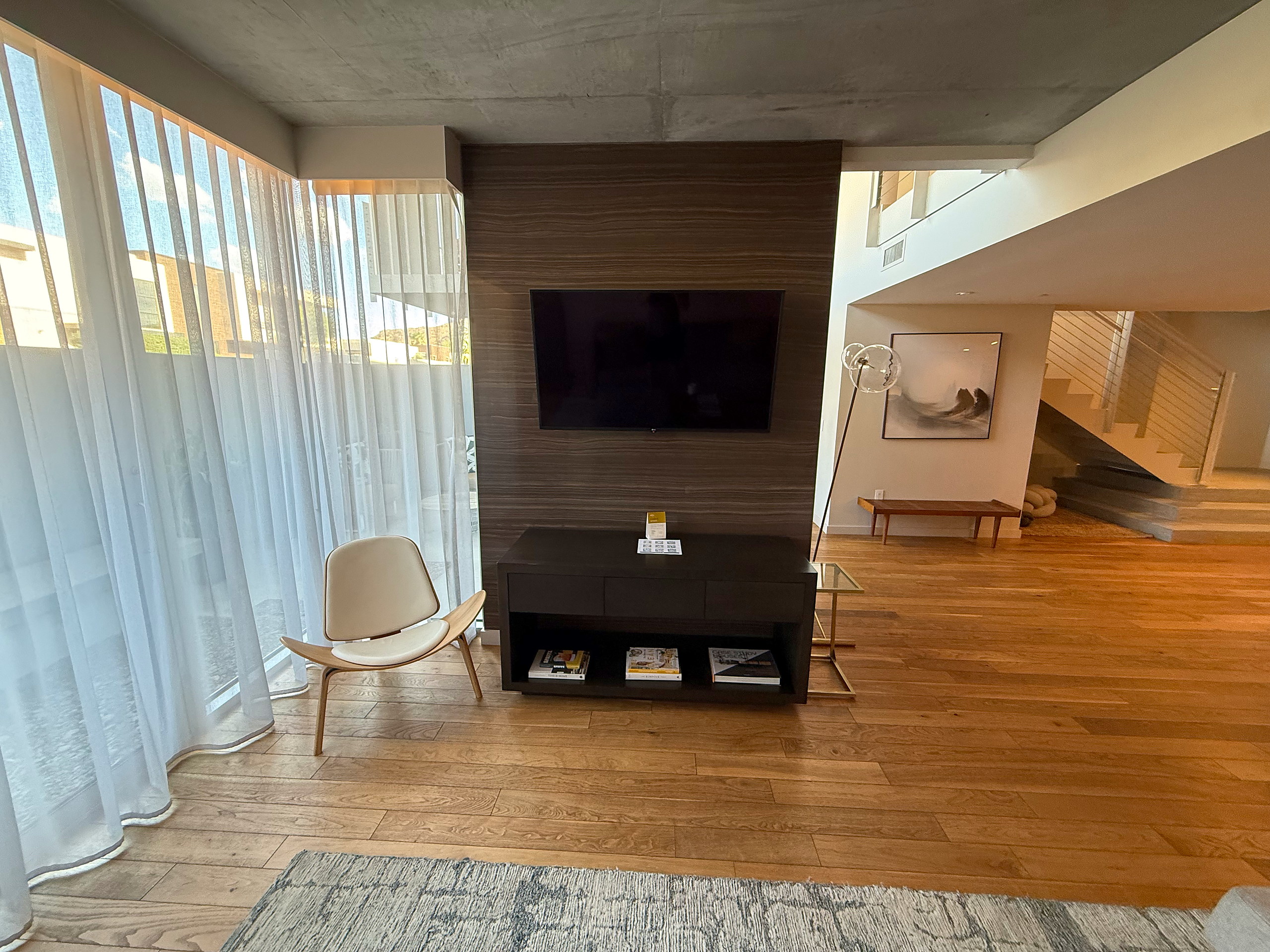 Living room looking toward the media wall and television