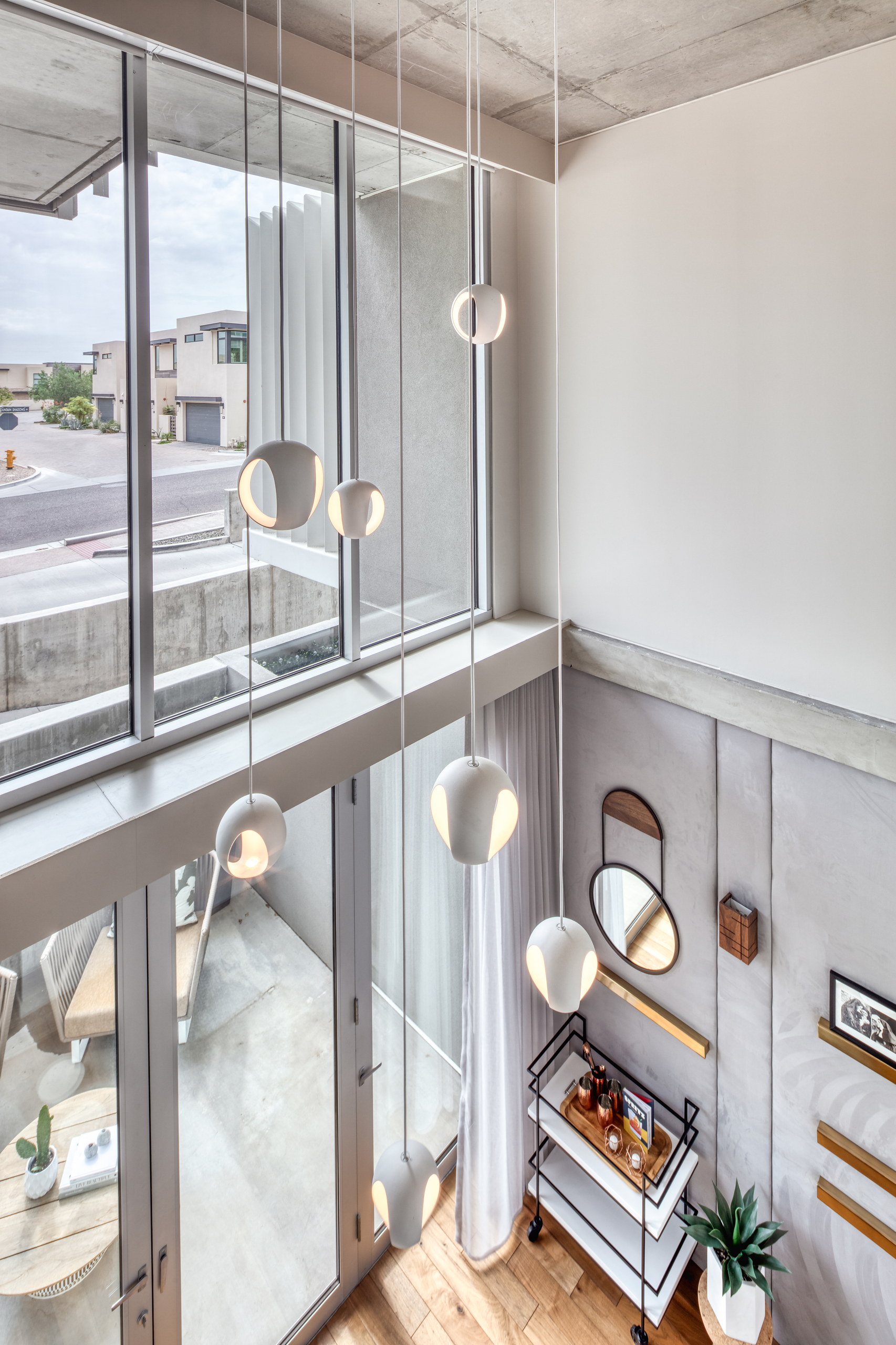 Pendants falling through the stairwell