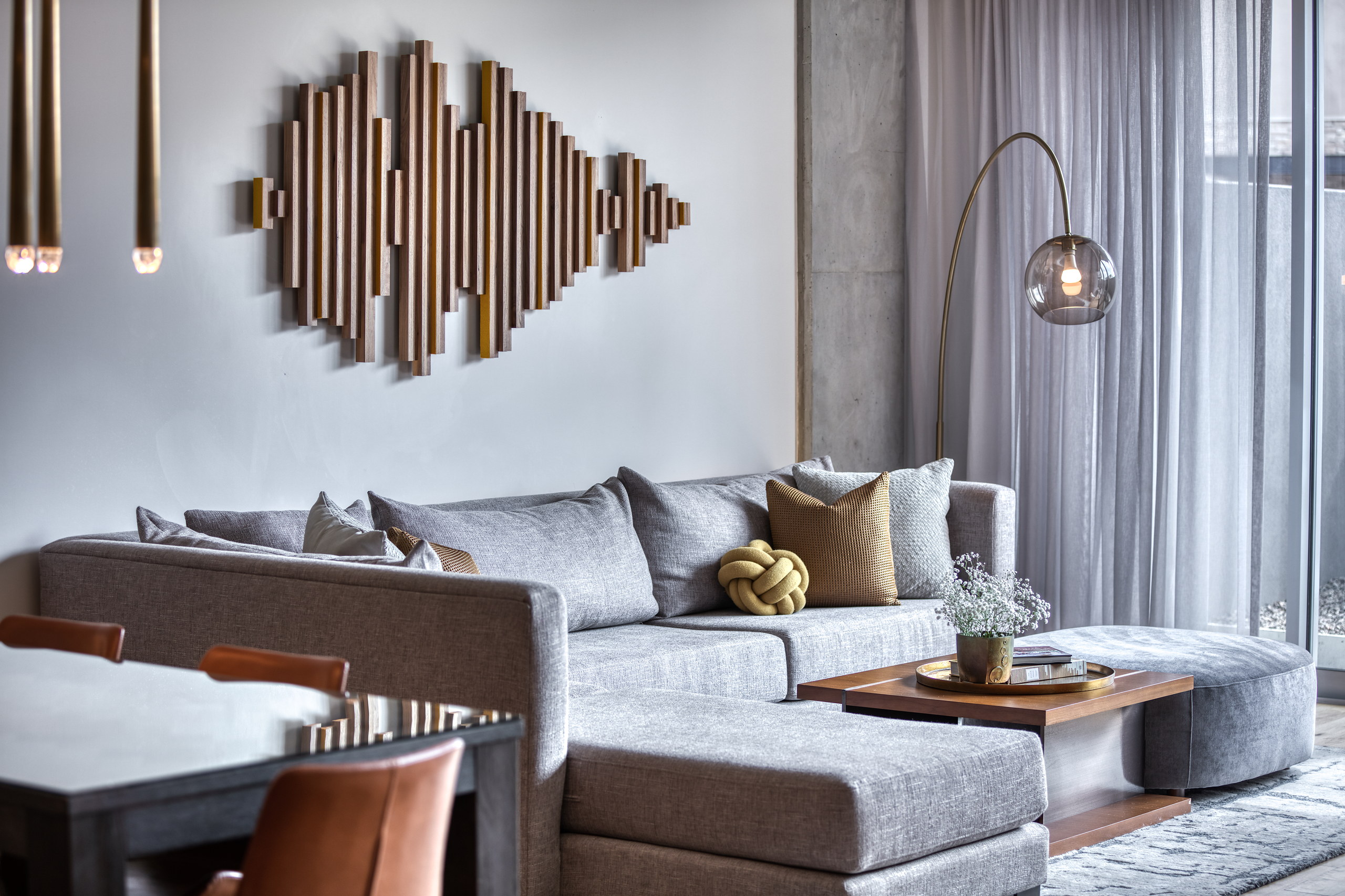Sectional, coffee table and arc lamp