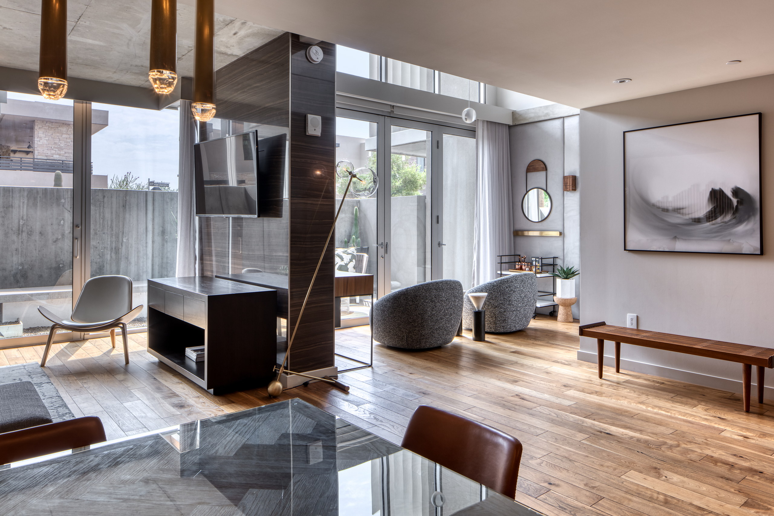 Open living area with swivel lounge chairs and stereo console